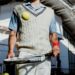 tennis player bouncing the ball on a racket