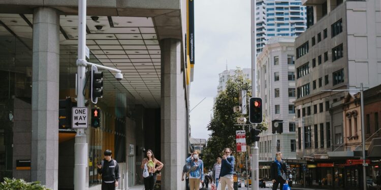 people walking on pedestrian lane