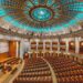 the interior of a large building with a dome