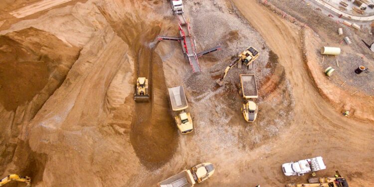 aerial photography of dump trucks