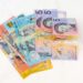 assorted-denomination banknote collection