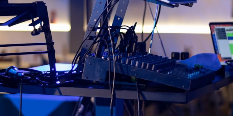 a laptop computer sitting on top of a table