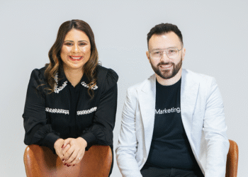 two people sitting together