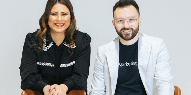two people sitting together