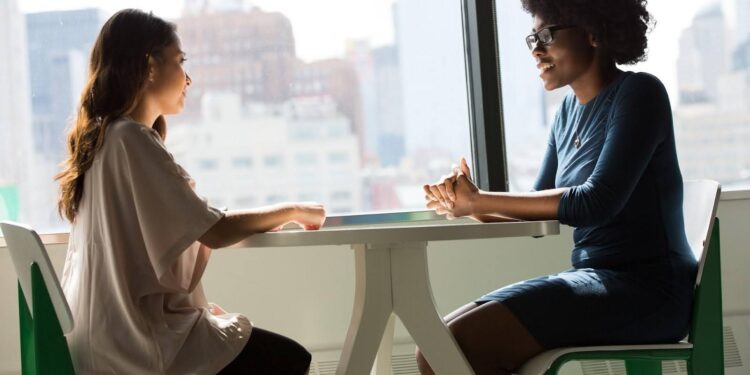 two women talking