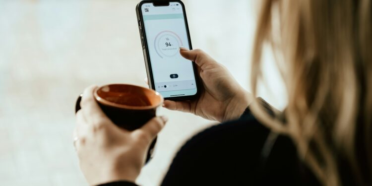 a person holding a cup of coffee